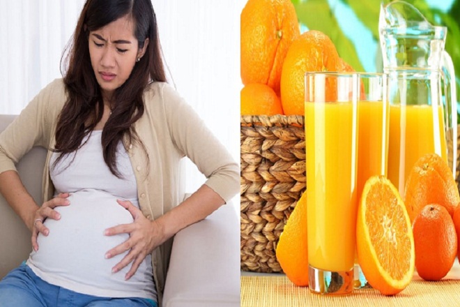 Những mẹ bầu đang gặp phải các vấn đề về dạ dày nên hạn chế uống nước cam